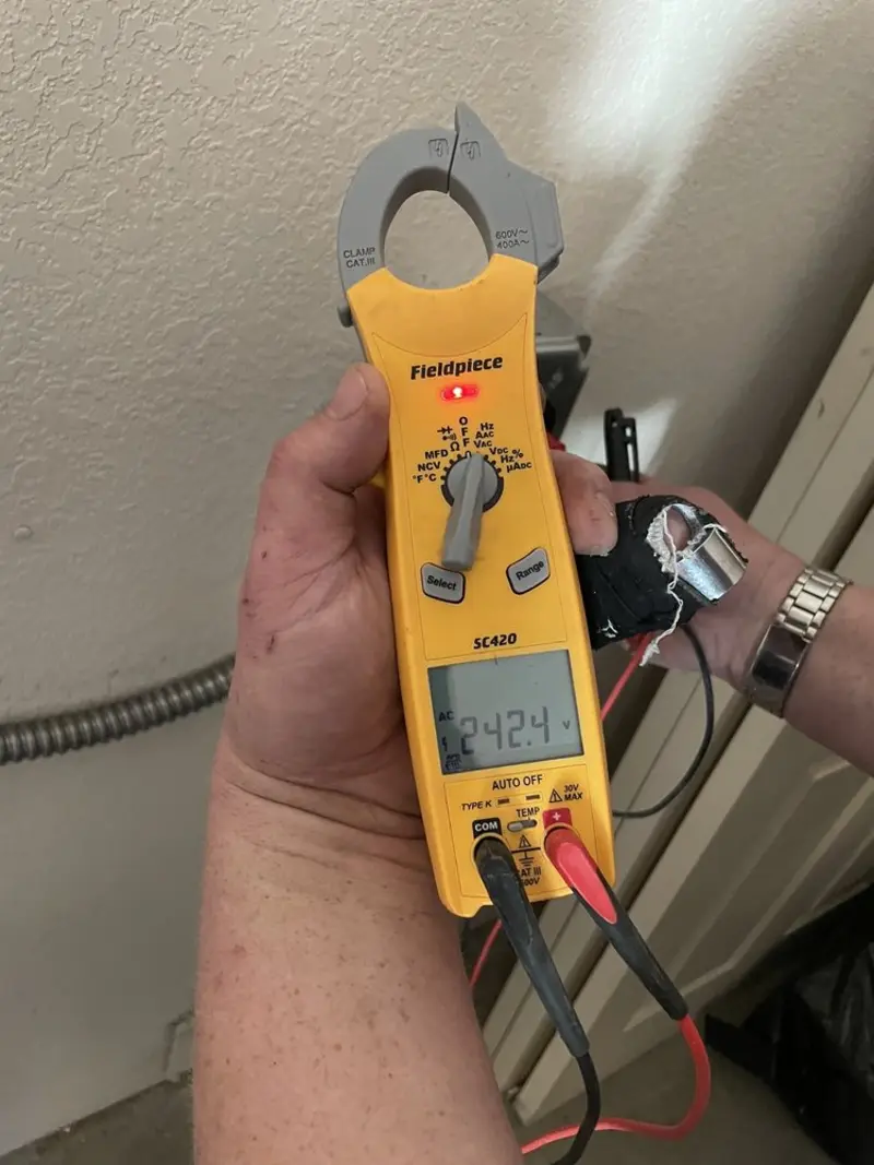 Voltage testing with clamp meter during Hot Tub / Pool Electrical Wiring in Highlands